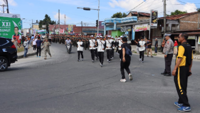 Polres Dairi Laksanakan Pengamanan Untuk Kirab Obor Api PON XXI Aceh-Sumut di Dairi