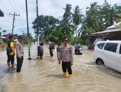 Polsek Tanjung Beringin Polres Sergai Meninjau Lokasi Banjir 
