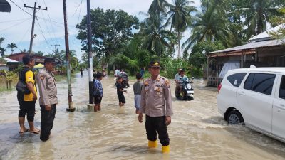 Polsek Tanjung Beringin Polres Sergai Meninjau Lokasi Banjir 